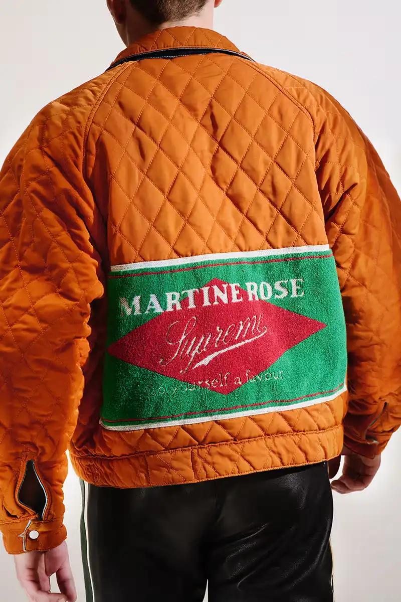 A variety of garments and accessories from the Martine Rose x Supreme capsule collection, including jackets, shirts, sweaters, hoodies, t-shirts, leather pants, jeans, bags, scarves, and hats