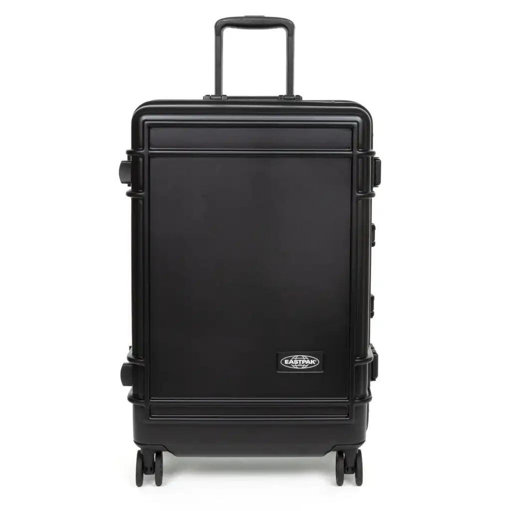 Eastpak Resist'r Case hard-shell luggage in three sizes - small, medium, and large - displayed in red, gray, and black colors. The suitcases feature a sleek polycarbonate exterior with aluminum frame, quiet wheels, and TSA-approved locks. Eastpak logo visible on the front