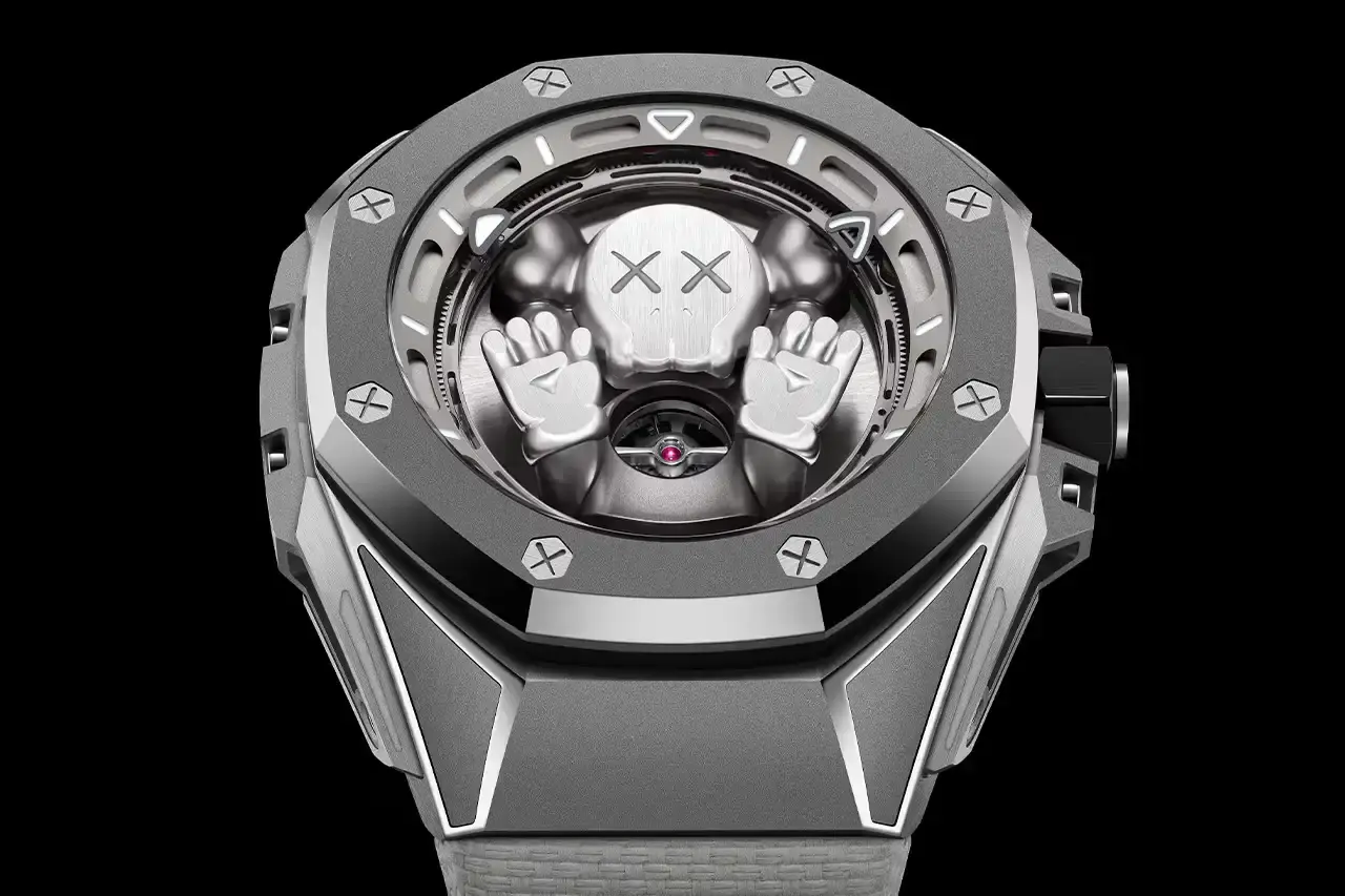 Audemars Piguet Audemars Piguet Royal Oak Concept Tourbillon COMPANION watch with gray KAWS character on sunburst titanium dial, featuring visible tourbillon movement in 43mm titanium case with two gray straps (image 4 of 6)