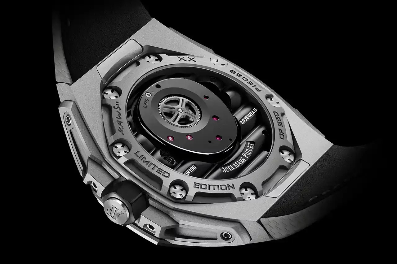 Audemars Piguet Audemars Piguet Royal Oak Concept Tourbillon COMPANION watch with gray KAWS character on sunburst titanium dial, featuring visible tourbillon movement in 43mm titanium case with two gray straps (image 5 of 6)
