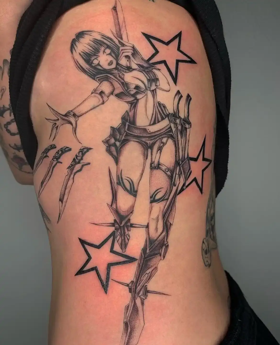 David Enth Article about David Enth, an LA tattoo artist known for large-scale futuristic tattoos and Y2K-inspired designs, who transitioned from medical studies to full-time tattooing. (image 8 of 17)