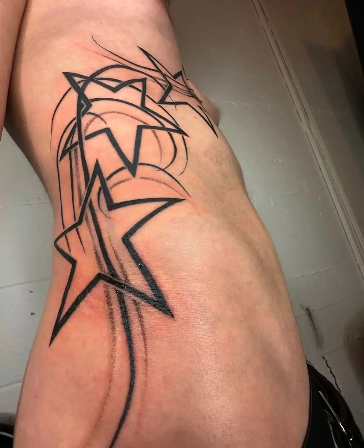 David Enth Article about David Enth, an LA tattoo artist known for large-scale futuristic tattoos and Y2K-inspired designs, who transitioned from medical studies to full-time tattooing. (image 14 of 17)