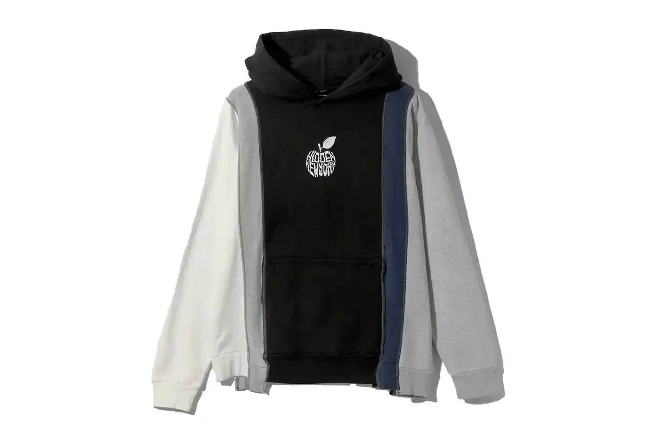 HIDDEN.NY AND NEEDLES UNVEIL LATEST COLLAB CAPSULE HIDDEN.NY and NEEDLES streetwear collaboration capsule collection featuring green hues, overlapping logos, and digital-inspired graphics on classic NEEDLES styles like Cut t-shirts, tracksuits, and mohair cardigans. Exclusive launch at NEPENTHES Tokyo on September 27, including unique REBUILD BY NEEDLES pieces (image 5 of 15)
