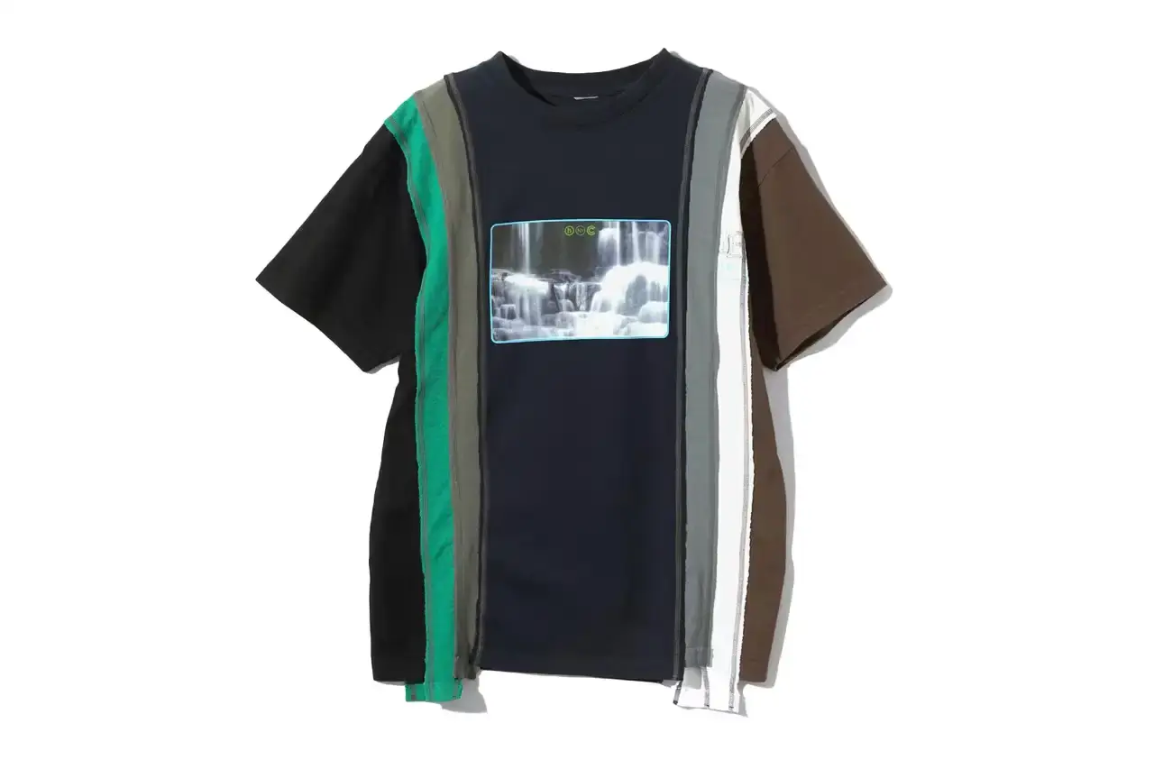 HIDDEN.NY AND NEEDLES UNVEIL LATEST COLLAB CAPSULE HIDDEN.NY and NEEDLES streetwear collaboration capsule collection featuring green hues, overlapping logos, and digital-inspired graphics on classic NEEDLES styles like Cut t-shirts, tracksuits, and mohair cardigans. Exclusive launch at NEPENTHES Tokyo on September 27, including unique REBUILD BY NEEDLES pieces (image 4 of 15)