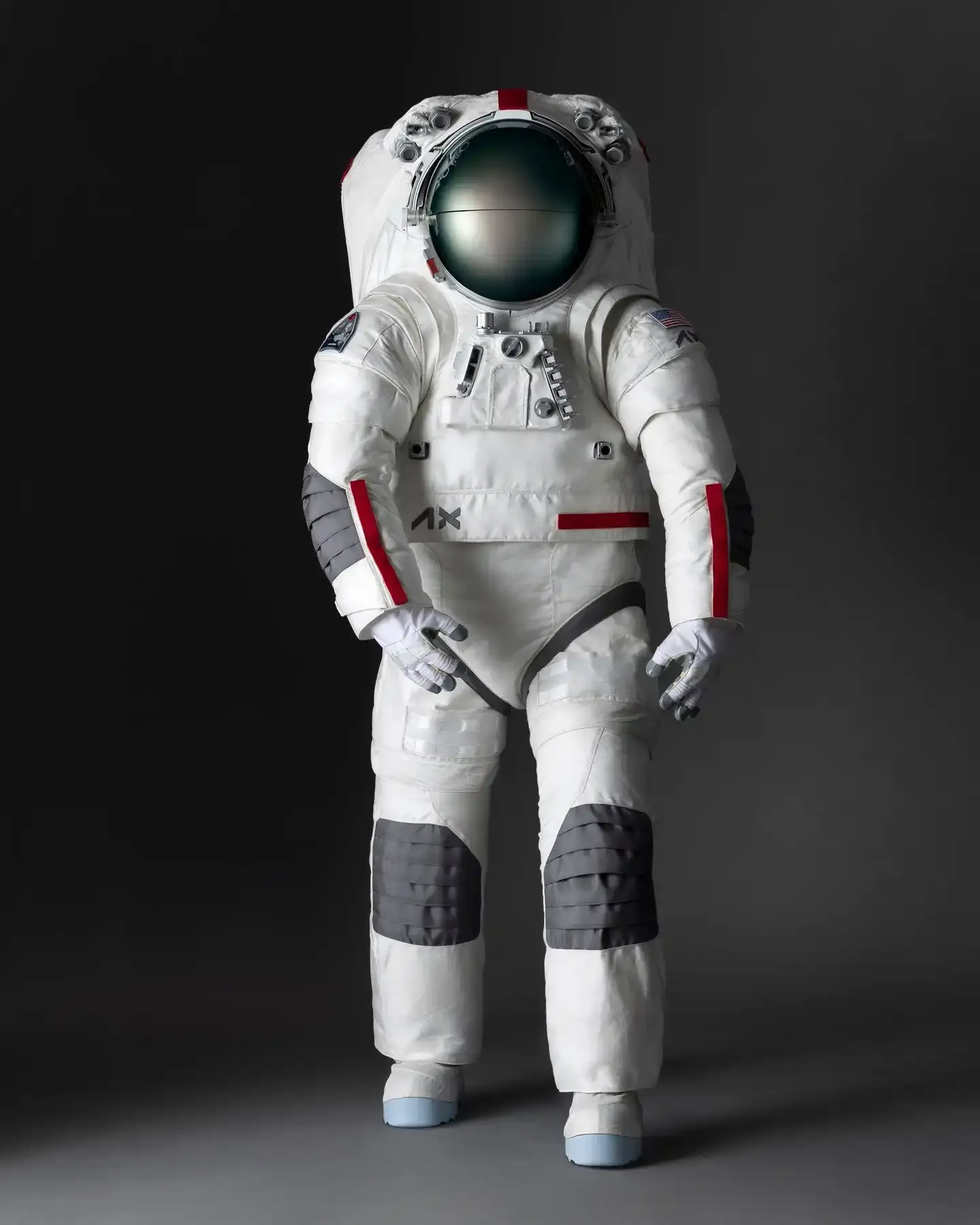 Prada-designed NASA spacesuit for Artemis III lunar mission. White AxEMU suit with enhanced comfort, flexibility, and safety features. Collaboration between luxury fashion and space technology
