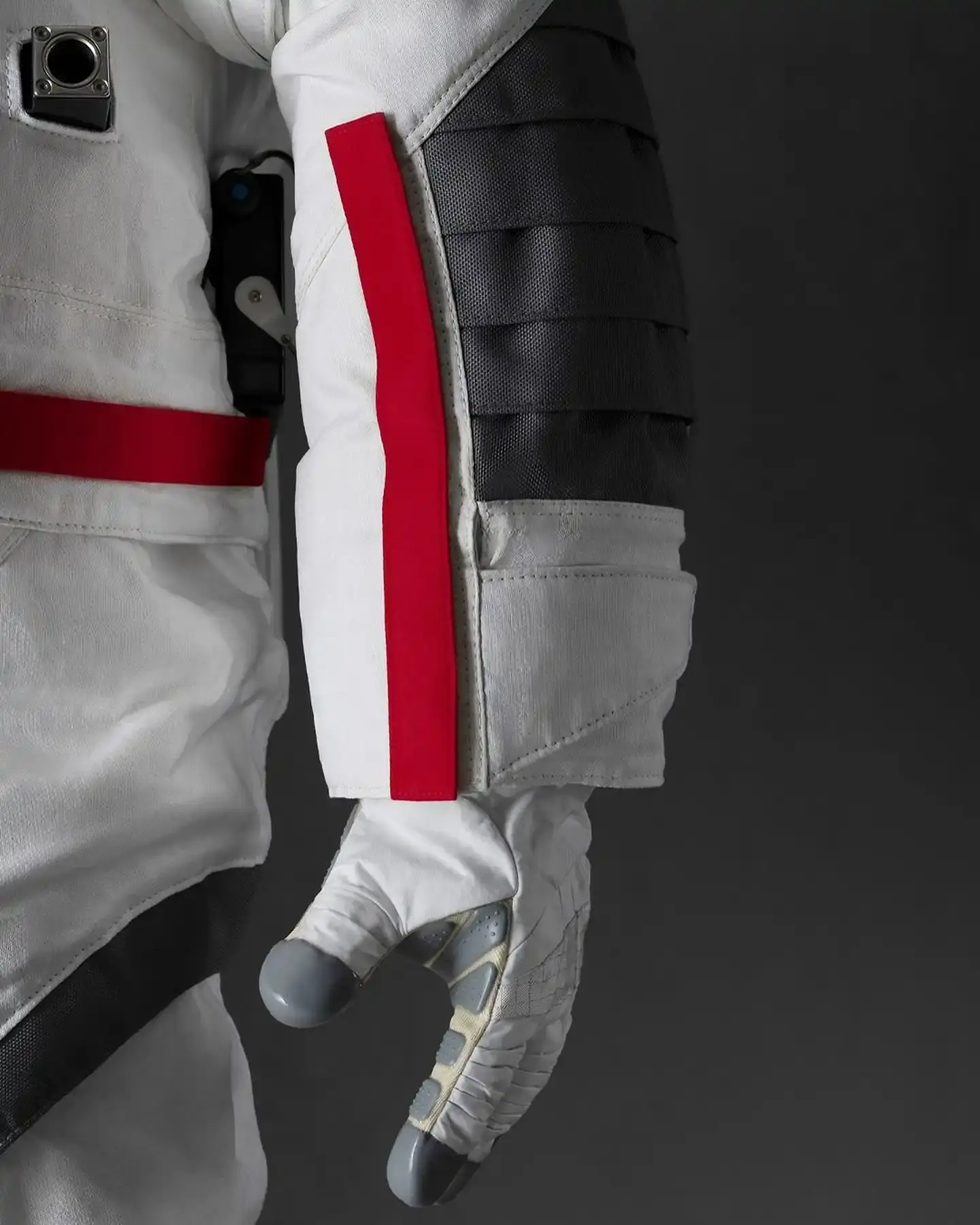 Prada-designed NASA spacesuit for Artemis III lunar mission. White AxEMU suit with enhanced comfort, flexibility, and safety features. Collaboration between luxury fashion and space technology (image 4 of 5)