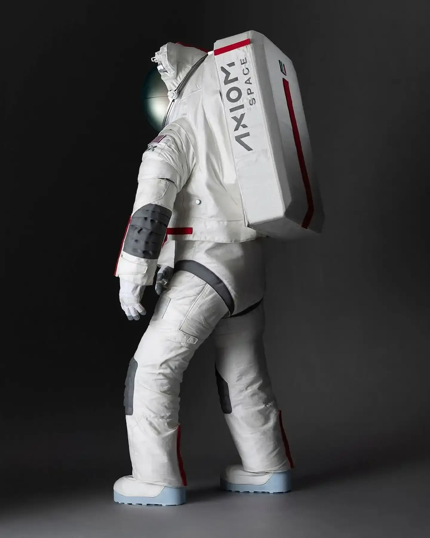 Prada-designed NASA spacesuit for Artemis III lunar mission. White AxEMU suit with enhanced comfort, flexibility, and safety features. Collaboration between luxury fashion and space technology (image 3 of 5)