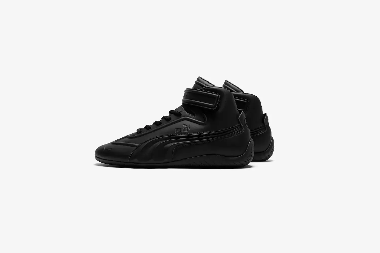 Juun.J/Puma PUMA x Juun.J Speedcat sneakers in high and low-top versions, featuring shadow colorways, curved Formstrip details, and tire-inspired soles against a neutral background.