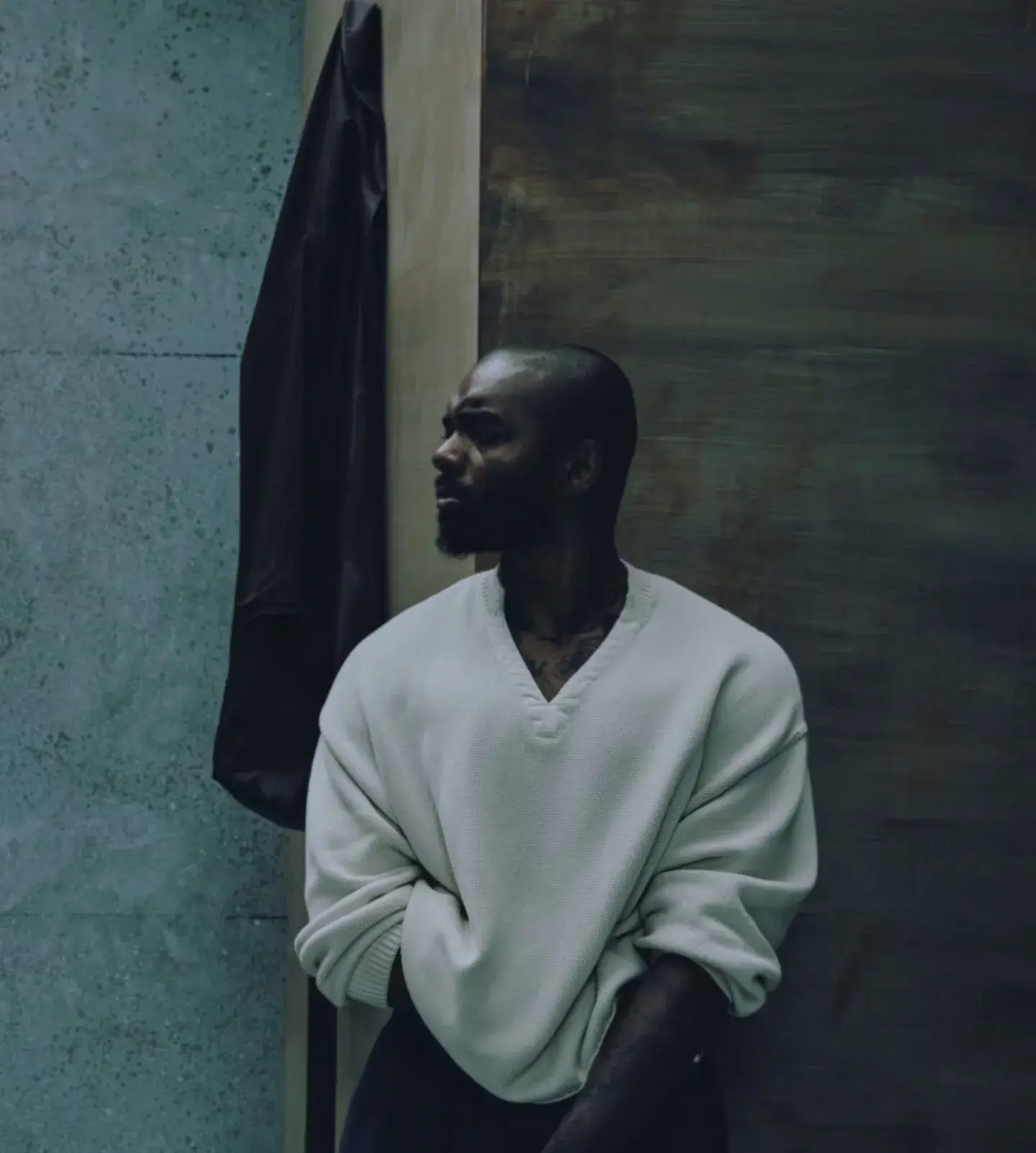 British designer Samuel Ross stands in a minimalist studio environment